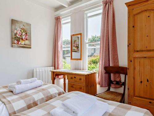 Ένα ή περισσότερα κρεβάτια σε δωμάτιο στο 2 Bed in Mevagissey LANYO