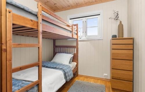 a bedroom with two bunk beds and a window at Awesome Home In seral With House A Mountain View in Åseral