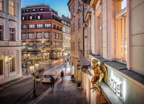 a view of a city street at night at Golden Angel Suites by Adrez in Prague