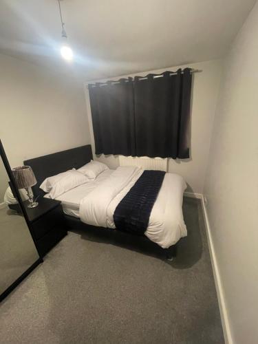 Ένα ή περισσότερα κρεβάτια σε δωμάτιο στο Beautiful en-suite bedroom