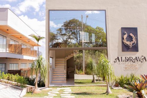 a building with a staircase in front of it at ALDRAVA POUSADA BOUTIQUE in Tiradentes