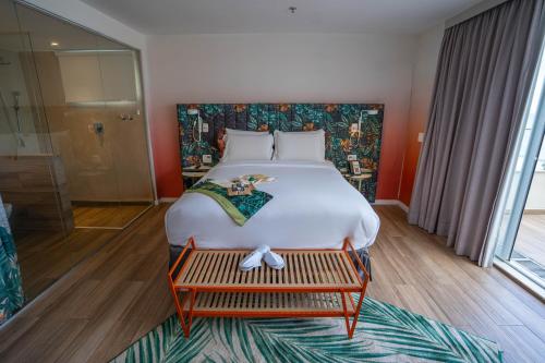 Postel nebo postele na pokoji v ubytování Mercure Rio Boutique Hotel Copacabana