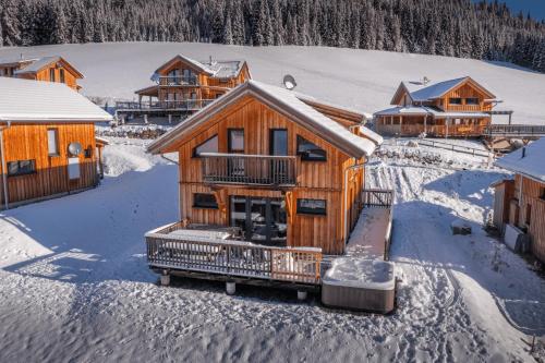 an aerial view of a log cabin in the snow at Chalet in Hohentauern - Chalet Ana in Hohentauern