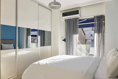 Posteľ alebo postele v izbe v ubytovaní lux central Athens apartment