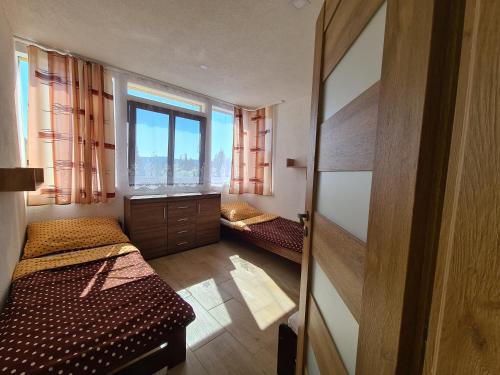 Postel nebo postele na pokoji v ubytování apartmán Sára