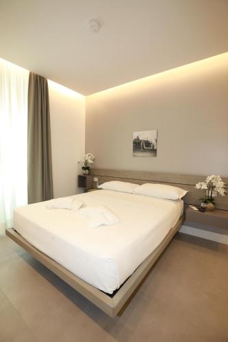 Ένα ή περισσότερα κρεβάτια σε δωμάτιο στο Unique Luxury Stay