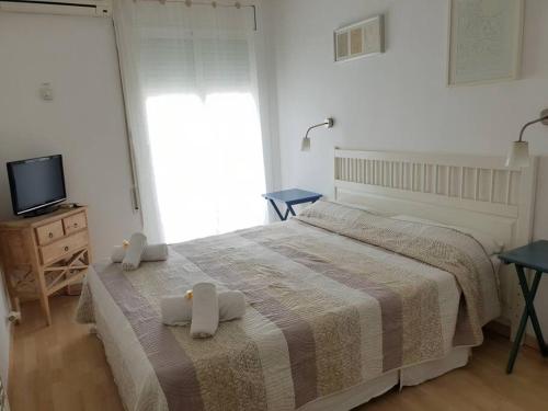 Llit o llits en una habitació de Hola! - Sitges Centric Apartment