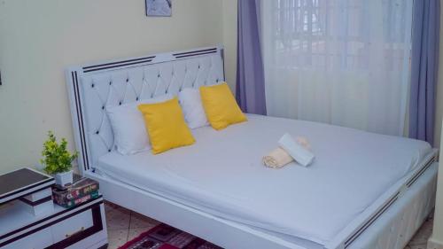 Postel nebo postele na pokoji v ubytování Precious homes airbnb