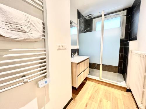 a bathroom with a shower and a sink at Stay house to Poitiers in Poitiers