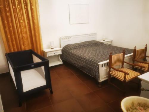A bed or beds in a room at Trevi al Centro