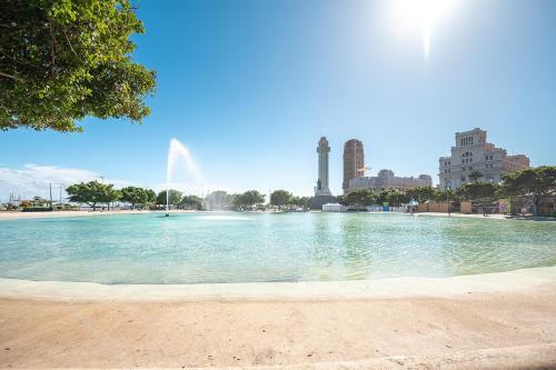 a large pool of water with buildings in the background at Magec Santa Cruz in Santa Cruz de Tenerife