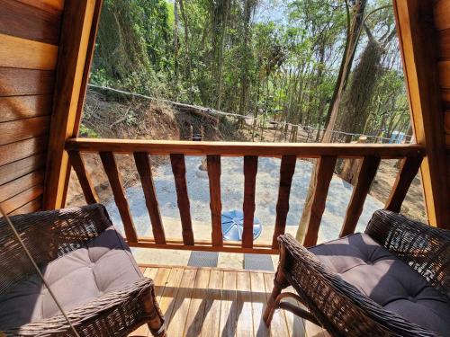 Balcon ou terrasse dans l'établissement Chalé - Romântico na Natureza