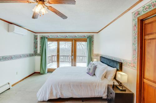 A bed or beds in a room at Bennington Home with Deck about 5 Mi to Bald Mountain!