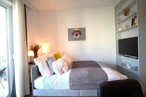 Postel nebo postele na pokoji v ubytování Buda Bay Apartments