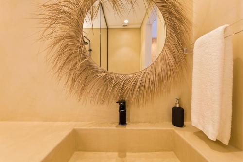 Et badeværelse på Boutique Rentals- AL MAR Beachfront