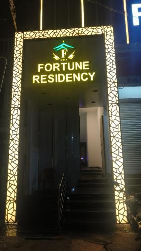 a entrance to a for future residencyowment with a sign at Fortune Residency in Tiruvannāmalai