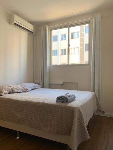 Ένα ή περισσότερα κρεβάτια σε δωμάτιο στο Apartamento - Gleba Palhano Home X