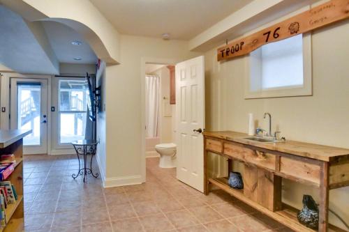 a bathroom with a sink and a toilet at Buckhead Home with On-Site Lake Oconee Access! in Eatonton 