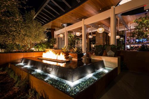 a fire pit in the middle of a building with a fire place at Durango Casino & Resort in Las Vegas