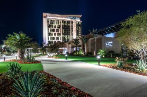 a driveway in front of a building at night at Durango Casino & Resort in Las Vegas