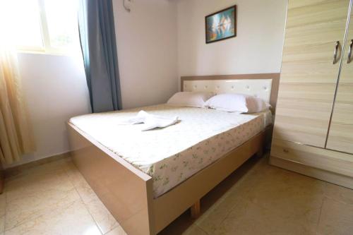 Llit o llits en una habitació de Novruzi Complex