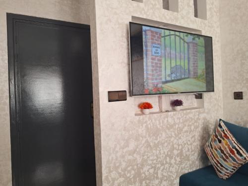 Télévision ou salle de divertissement dans l'établissement Agadir Tranquility : Cozy Pad