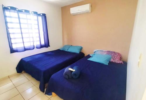 Residencial Privado con Alberca - 10 Min Malecón - 10 Personas 객실 침대