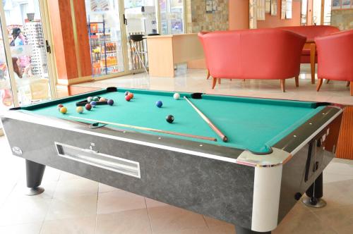a pool table with balls on it in a store at Vita Park Hotel & Aqua Park in Albena