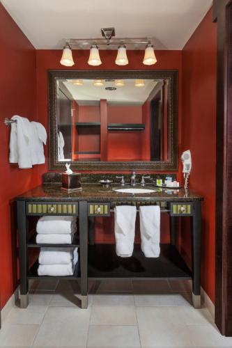 a bathroom with a sink and a mirror at Bear Creek Mountain Resort in Breinigsville
