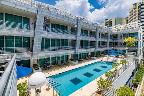 an exterior view of a building with a swimming pool at Suites Ocean Drive Hotel in Miami Beach