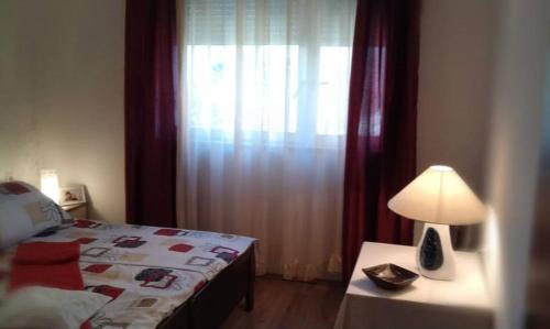 Postel nebo postele na pokoji v ubytování Apartment Lala