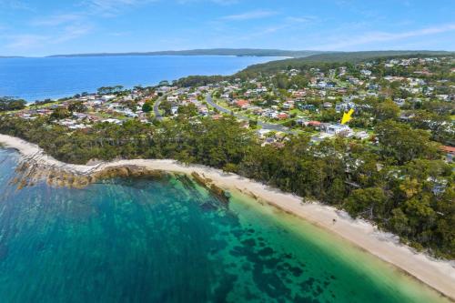 an aerial view of a beach with a resort at Blanca Beach House 2 Vincentia in Vincentia