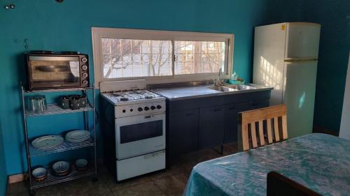 DEPARTAMENTO MODERNO, EXCELENTE ZONA CON COCHERA tesisinde mutfak veya mini mutfak