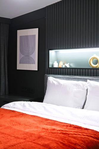 Katil atau katil-katil dalam bilik di TAKS-INN Hotel