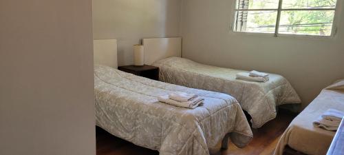 Katil atau katil-katil dalam bilik di Excelente ubicación, frente a Plaza Independencia