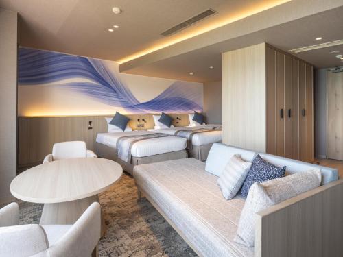 Postel nebo postele na pokoji v ubytování Irago Ocean Resort