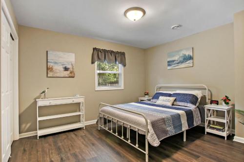 a bedroom with a bed and a window at 26211 Antioch in Antioch