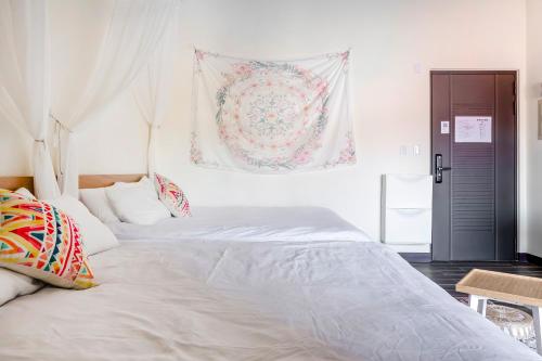 Postel nebo postele na pokoji v ubytování Pumori Guesthouse