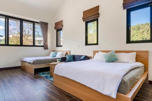 Postel nebo postele na pokoji v ubytování Pumori Guesthouse