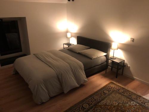 Кровать или кровати в номере Spa-Francorchamps / Jahlay Maison 6p de caractère