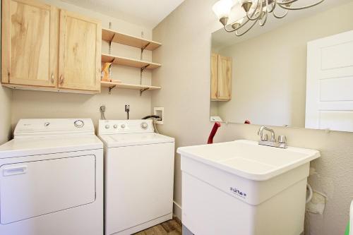 a laundry room with a washer and dryer and a sink at Silvertown by AvantStay Gorgeous Home in Fantastic Location in Park City in Park City