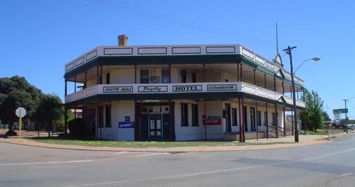 an old building on the corner of a street at Pingelly Hotel in Pingelly