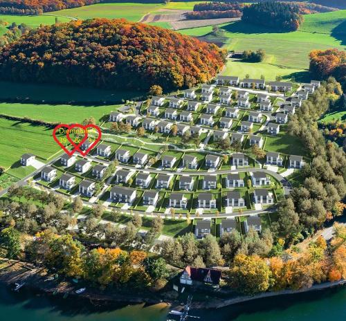 an aerial view of an apartment complex with a red circle at Ferienhaus Diemelblick 39 in Heringhausen