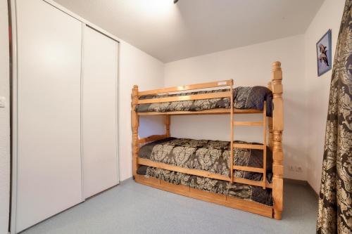 Palanda nebo palandy na pokoji v ubytování Douces vacances à La Tranche-sur-Mer