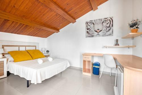 Ένα ή περισσότερα κρεβάτια σε δωμάτιο στο Casa Esther