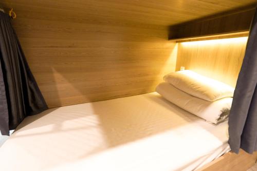 Cama o camas de una habitación en MOTOGO Hostel