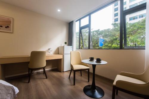 Weisu Service Apartment - Shenzhen Songpingshan Science and Technology Park Storeにあるシーティングエリア