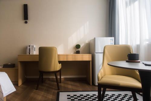 Weisu Service Apartment - Shenzhen Songpingshan Science and Technology Park Storeにあるシーティングエリア