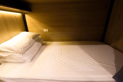 Cama o camas de una habitación en MOTOGO Hostel