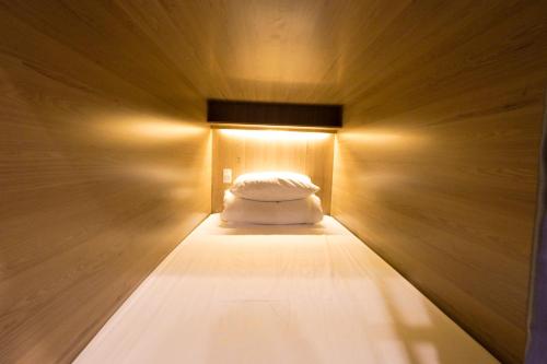 Cama o camas de una habitación en MOTOGO Hostel